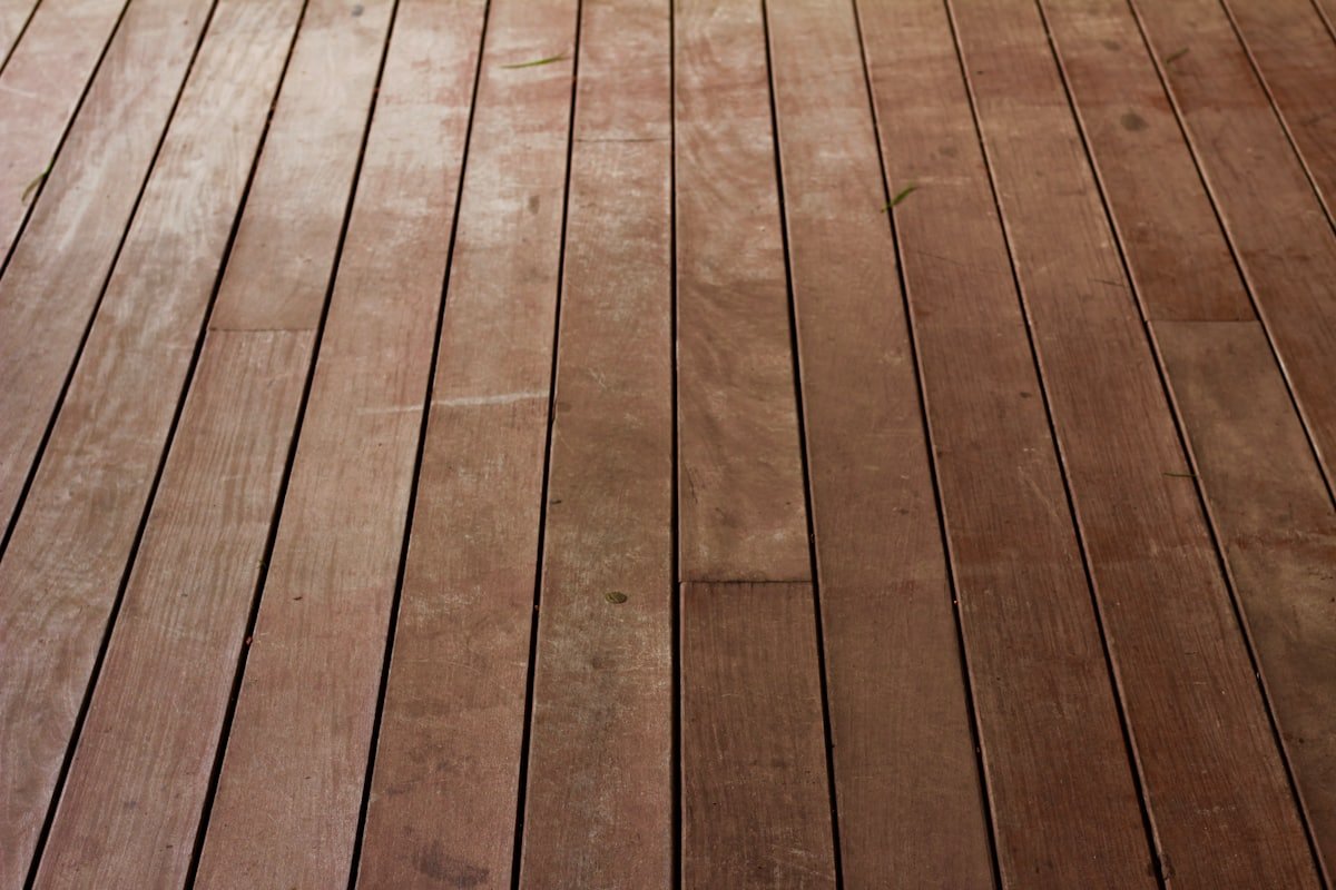 Hand-fastened cedar decking boards showing Texas Deck & Fence craftsmanship